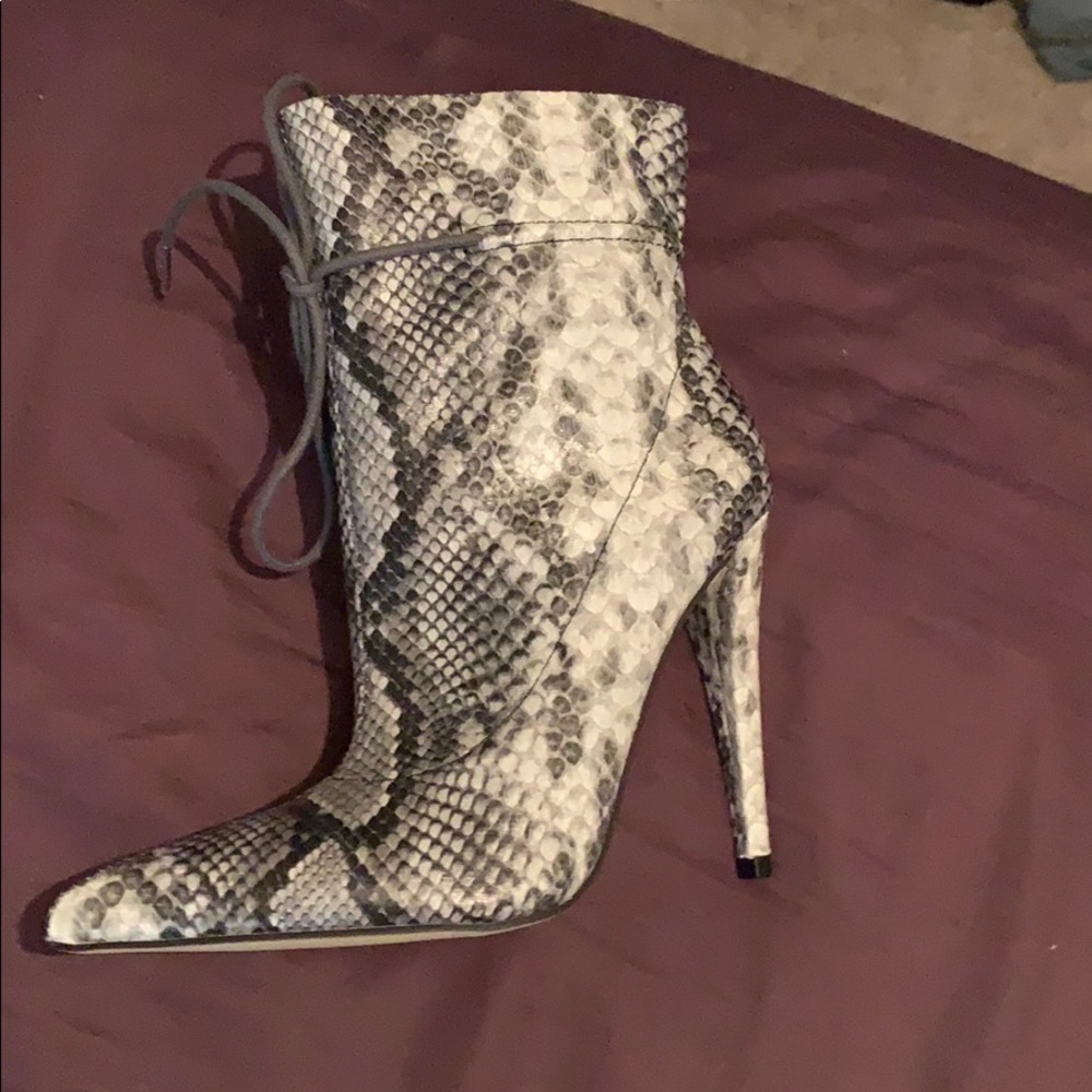 Black and white snakeskin booties